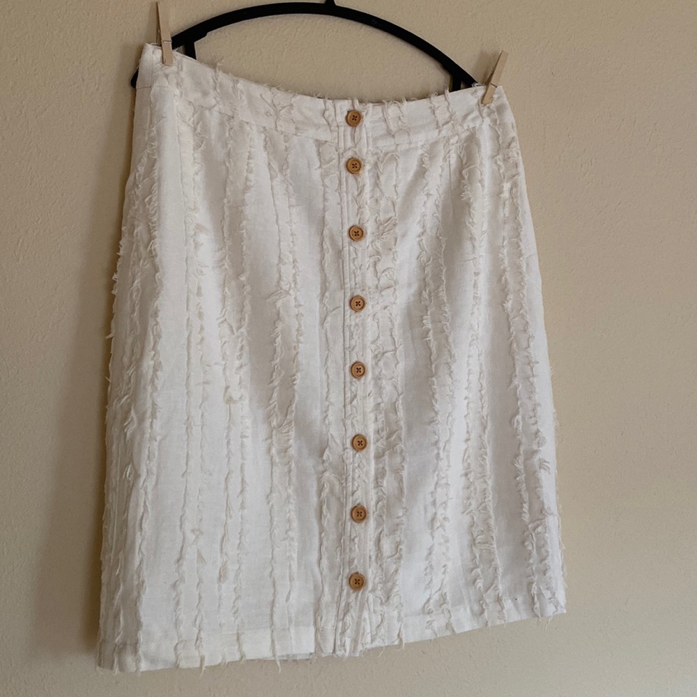Anthropologie XL cream linen knee length skirt raw edge detail, button front